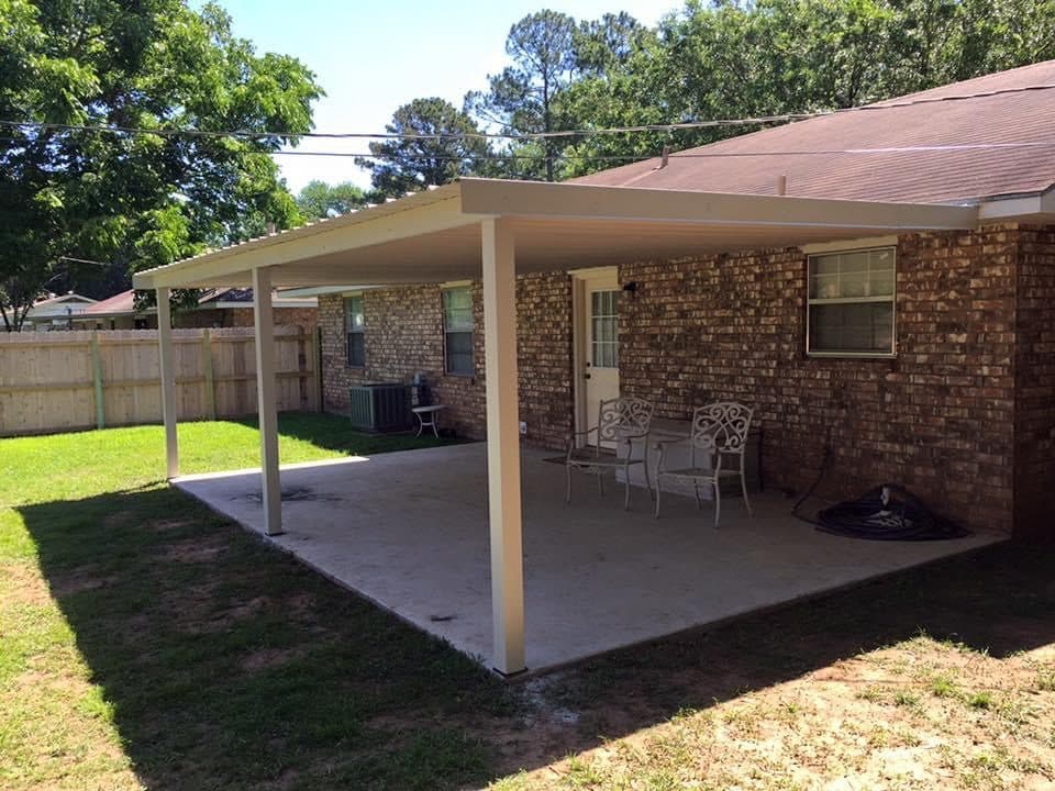 Patio cover on a brick home